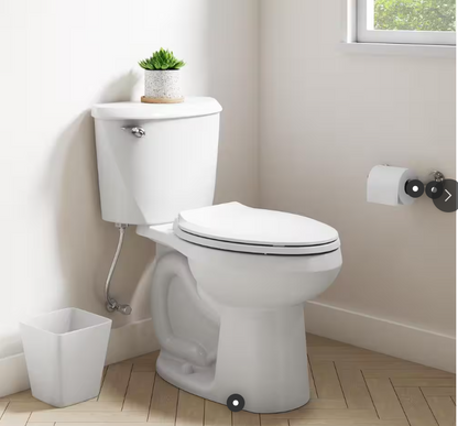 American Standard Reliant 12 in. Rough In 2-Piece 1.28 GPF Single Flush Elongated Toilet with Slow Close Seat in White